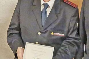 2026-3-11-NO-Rolf Braun-Jahreshauptversammlung FFW NO-Ehrung Wolfgang Schwarz_ausschintt